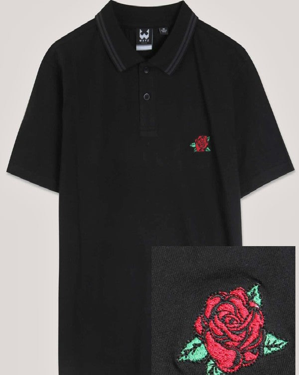Polo con rosa bordada